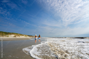People running on beach on Jekyll Island
